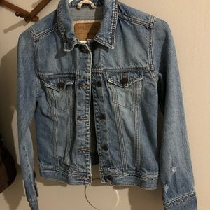 Distressed denim jacket